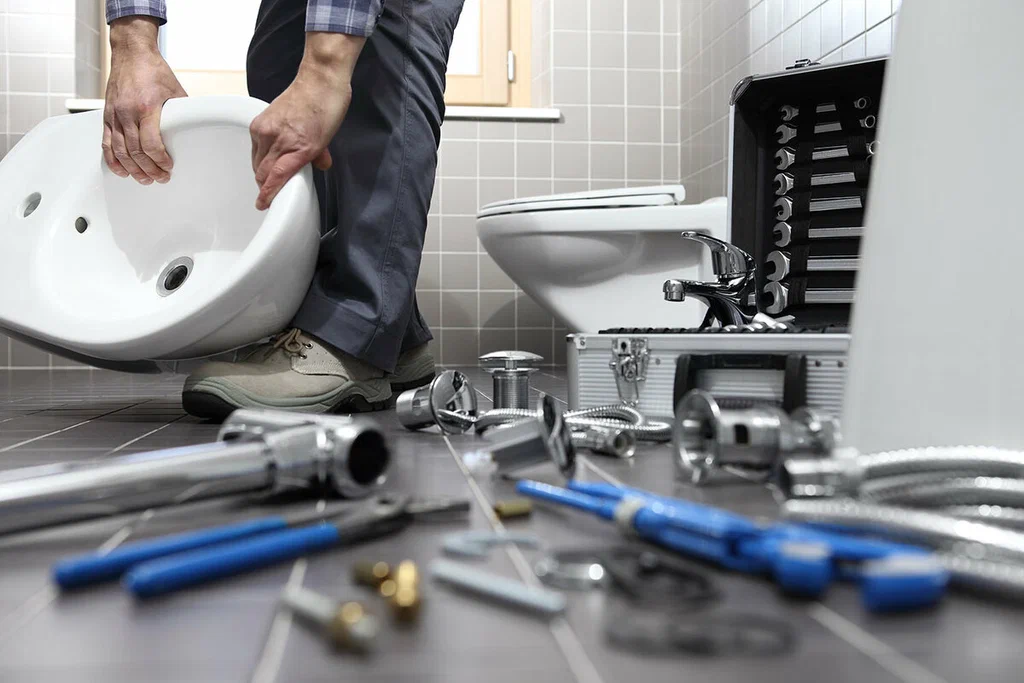 Plumbing tools prepared for a bathroom repair in Miami Gardens
